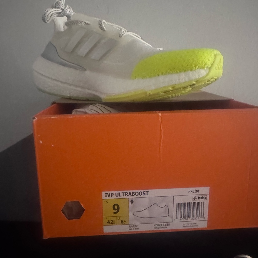 Adidas White and Yellow Sneakers with Sleek Design